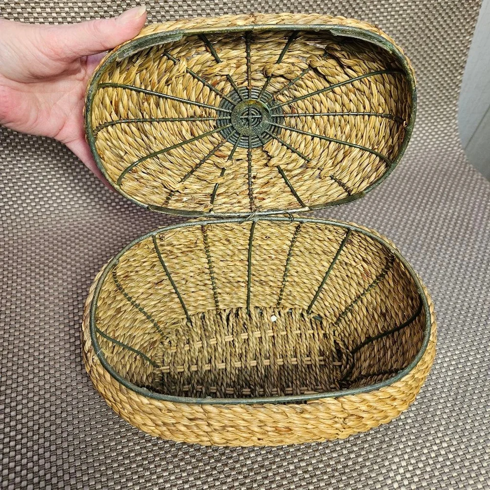 Vintage hand-woven coiled rye straw rattan wicker basket with metal leaf topper